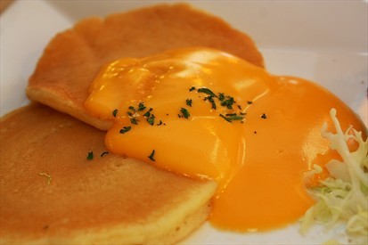 Pancakes in cheese sauce