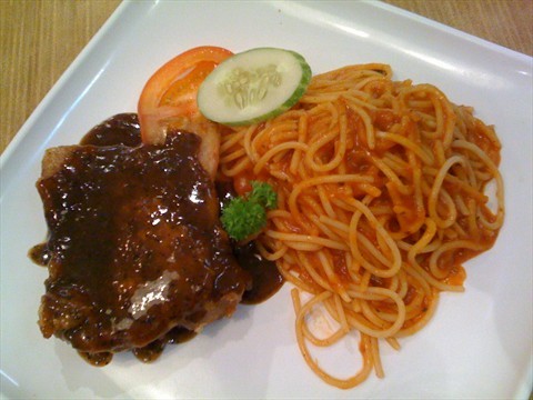 black pepper pork chop w/ spaghetti.