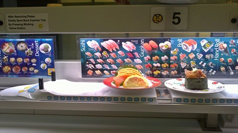 Shinkansen serving our salmon sashimi & sushi