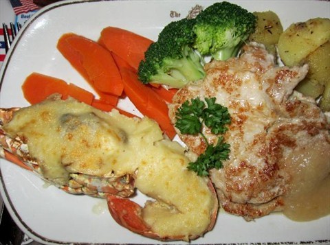 Lobster Thermidor with Pork Chop