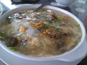 spinach cooked with three types of eggs