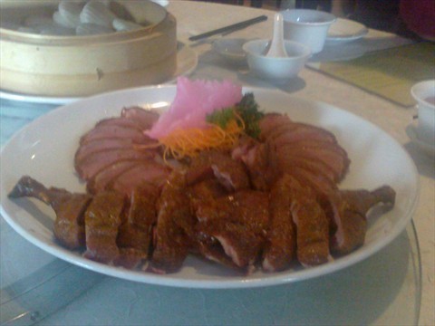 Peony Jade's famed tea smoked duck with steamed buns