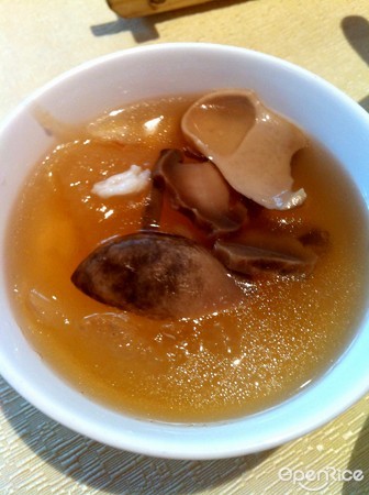 Double boiled whole wintermelon soup with seafood treasure