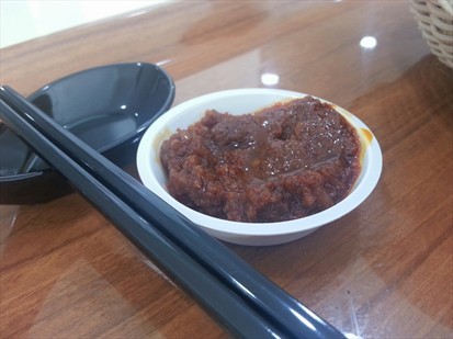 Sambal Chilli but i suggest go with soy sauce with chilli padi instead