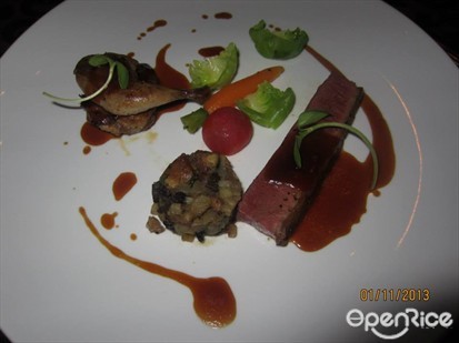 Roasted duck breast & quail served with potatoes