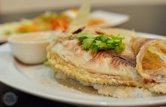 Pla Nin Pao, Salt-baked Whole Tilapia with Seafood Dipping Sauce | S$22.80/++