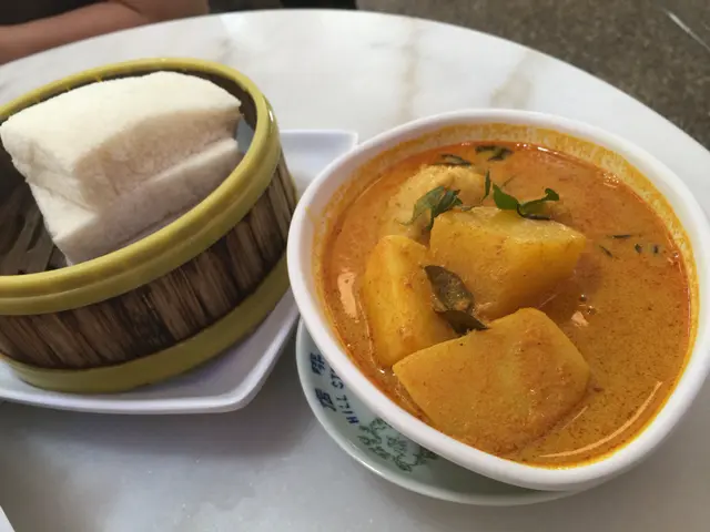Curry  Chicken  with  Streamed  Bread