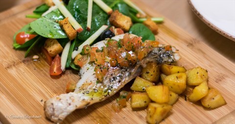 Sea bass, tomato concasse capers with baby spinach salad
