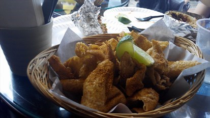 Deep-fried Chicken skin topped with Hombre spice blend!