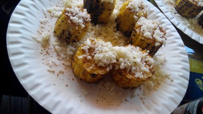Grilled corn topped with Hombre Spice and cheese!Must-try!