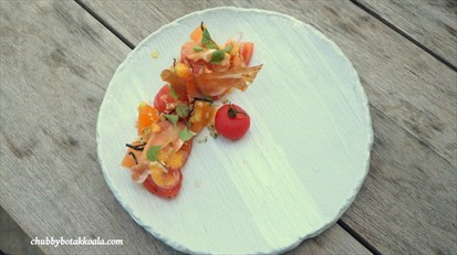 Portico Salad of vine-ripened tomatoes plated by Chubby Botak Koala