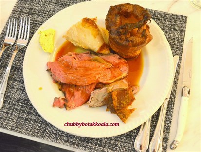 Roast Chicken Breast, Roast Beef, Roast Pork and Yorkshire Pudding filled with gravy