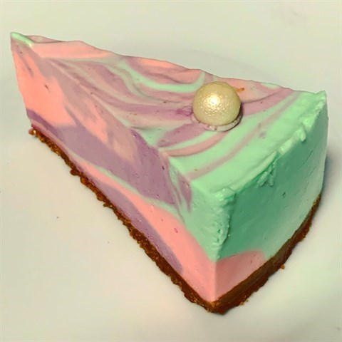 Gorgeous under-the sea dream, non-baked caramel mermaid cheesecake, complete with a white chocolate pearl.
