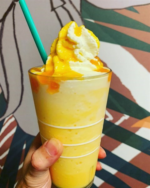 Delectable combination of fruity melon syrup blended with milk & ice, layered atop a splash of green-coloured melon powder, resembling a slice of fresh cantaloupe, topped with fluffy whipped cream as well as cantaloupe sauce loaded with more melon ch