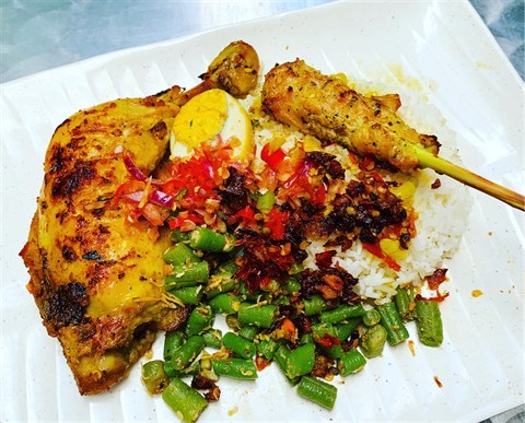 Balinese grilled betutu chicken with steamed white rice, sate lilit, telur pindang, sayur urab, sambal matah & sambal embe.