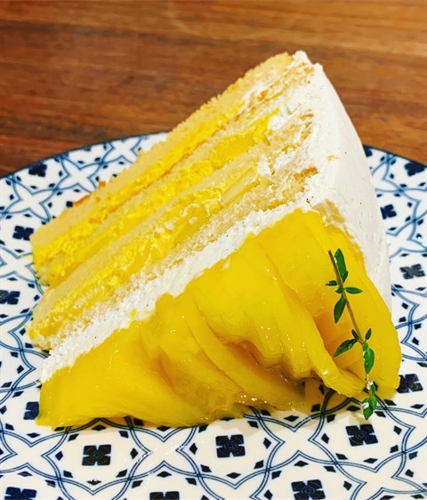 Asian style mango cake made of fluffy cotton soft sponge cake, fresh & juicy mango, with fresh light cream.
