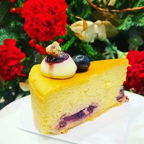 Velvety pistachio-blend cheesecake with tart blueberry marmalade.