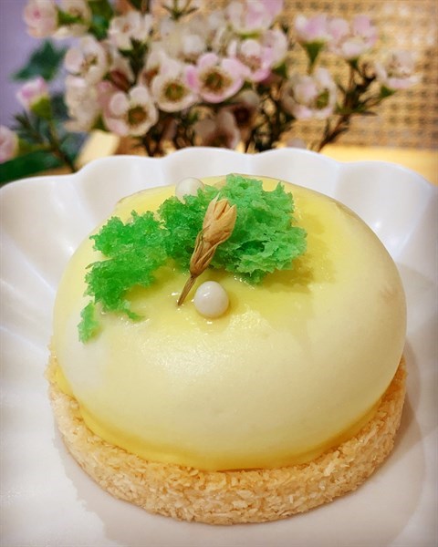 With soursop mousse, candied pineapple & coconut disc biscuit.