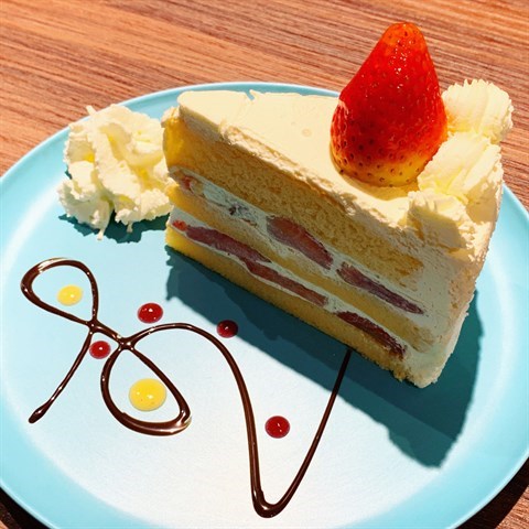 Moist, airy & light multi-layered sponge cake with strawberries & whipped cream fillings in between.