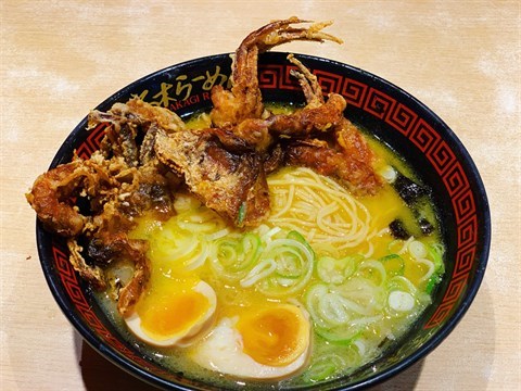 Soft-shell crab ramen with salted egg sauce, roasted seaweed, spring onions & gooey Japanese Ajitama egg, served with a bowl of signature 12hr boiled Tonkotsu soup.