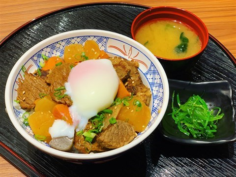 A4/A5 Miyazaki & Australian Wagyu stew with seasonal vegetables topped with onsen egg on rice.