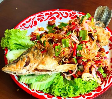 Fried Fish in Spicy Herb Salad